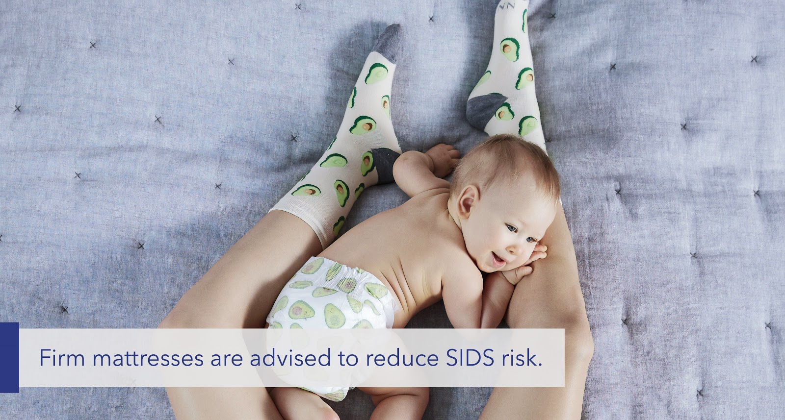 text: Firm mattresses are advised to reduce SIDS risk.