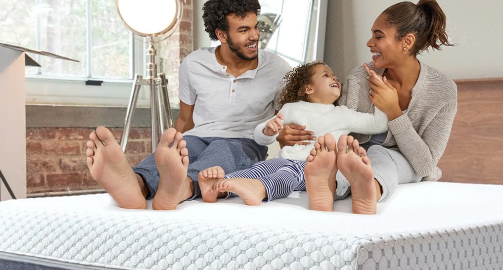 Family enjoying a new mattress
