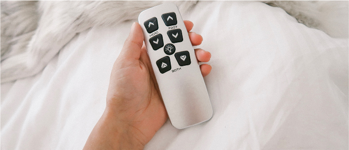 holding a remote