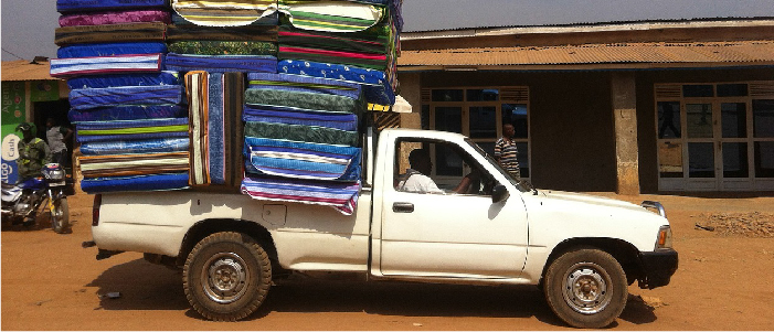 mattress strapped in a moving truck